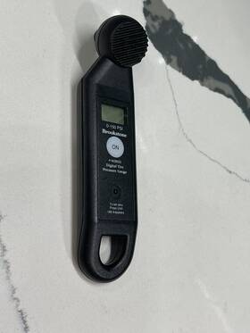 143933 Brookstone Digital Tire Pressure Gauge #143933 0-150 Psi Auto-on