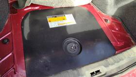 25697653 Buick 2006-2011 Lucerne Spare Tire Cover Plastic Shield With Nut Oem