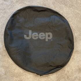 82209950ab Mopar 1997-2018 Jeep Wrangler 16 Inch Tire Cover Black With Logo Genuine Oem