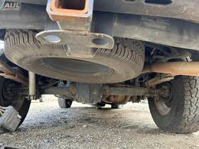 566.da1509 Nissan Frontier 2009 Spare Wheel Carrier 104734014