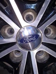 Ford Taurus Sho Sunflower Wheel. Fixed Price $170.00.