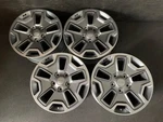 (4) Jeep Wrangler Original Machined/charcoal Wheels Rims + Caps 17" HOL.9118. Fixed Price $549.00.