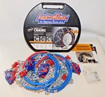 0155510 Autotrac Self-tightening Tire Chains, Pair Never Used. Fixed Price $36.00.