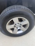 Have 05 Nissan Titan Factory Rims And New Tires For Sale.. Fixed Price $634.00.