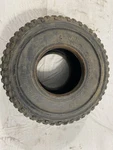 Used Original Ohtsu Tire 25X12.0-9. Fixed Price $150.00.