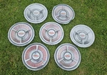 Set Of 7 1962 Oldsmobile Starfire Deluxe 14" Hubcaps Wheel Covers. Fixed Price $179.00.