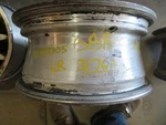 Wheel 15X6 Aluminum 14 Spoke Silver And Gray Background Fits 96-98 Sable 240279. Fixed Price $76.00.