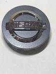 New Genuine 2014-2018 Nissan Murano Altima Rogue Center Cap Ornament 40342 4RB5A. Fixed Price $34.00.