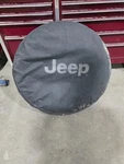 07-18 Jeep Wrangler Cloth Spare Tire Cover Factory Mopar Oem. Fixed Price $50.00.