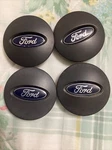 Ford Oem Center Hub Cap Dark Gray 6L241A096AA 3L241A096AA 3F231A096DC Set 4PCS. Fixed Price $35.00.
