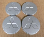 Mitsubishi Galant Wheel Rim Hubcap Center Set Of 4 Oem Pushes Through. Fixed Price $73.99.