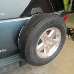 Liberty 2002 Spare Wheel Carrier 755627. Fixed Price $119.90.