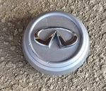 03 - 04 Infiniti G35 Oem Silver Alloy Wheel Center Cap. Fixed Price $24.95.