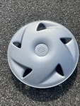One Genuine 1989 Suzuki Swift 13 Inch Hubcap Wheel Cover. Fixed Price $28.16.
