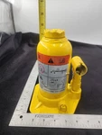 Ford Superduty 4 Ton Bottle Jack - Oem Yellow. Fixed Price $57.00.