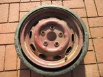 Porsche 911 Spare Tire 1/2J X 15H2 Date Stamped 42/86 FL#11. Fixed Price $496.00.